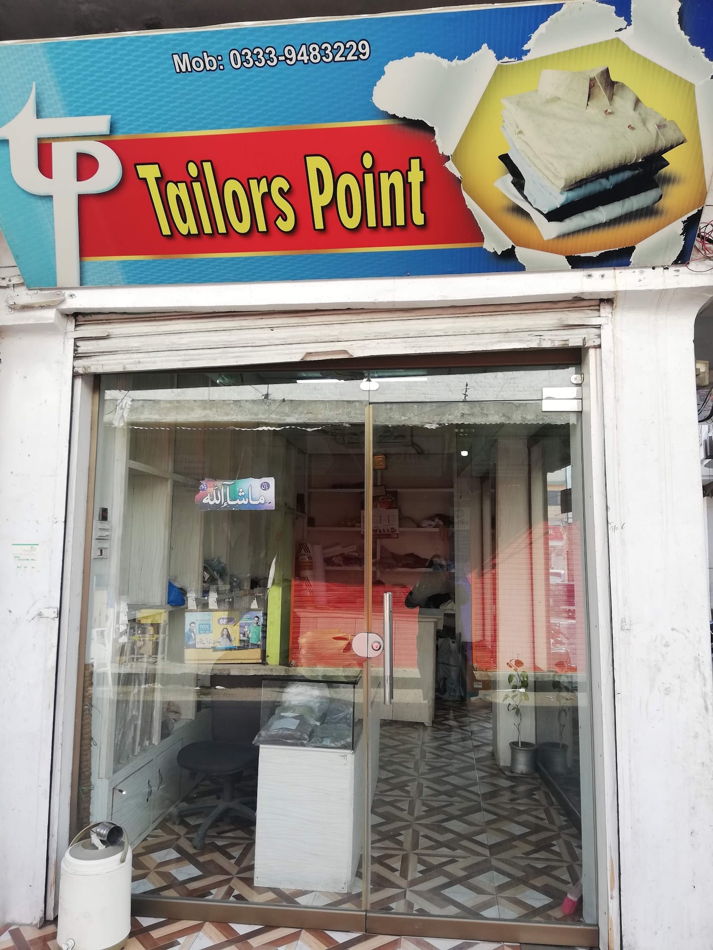 Top Tailors Point